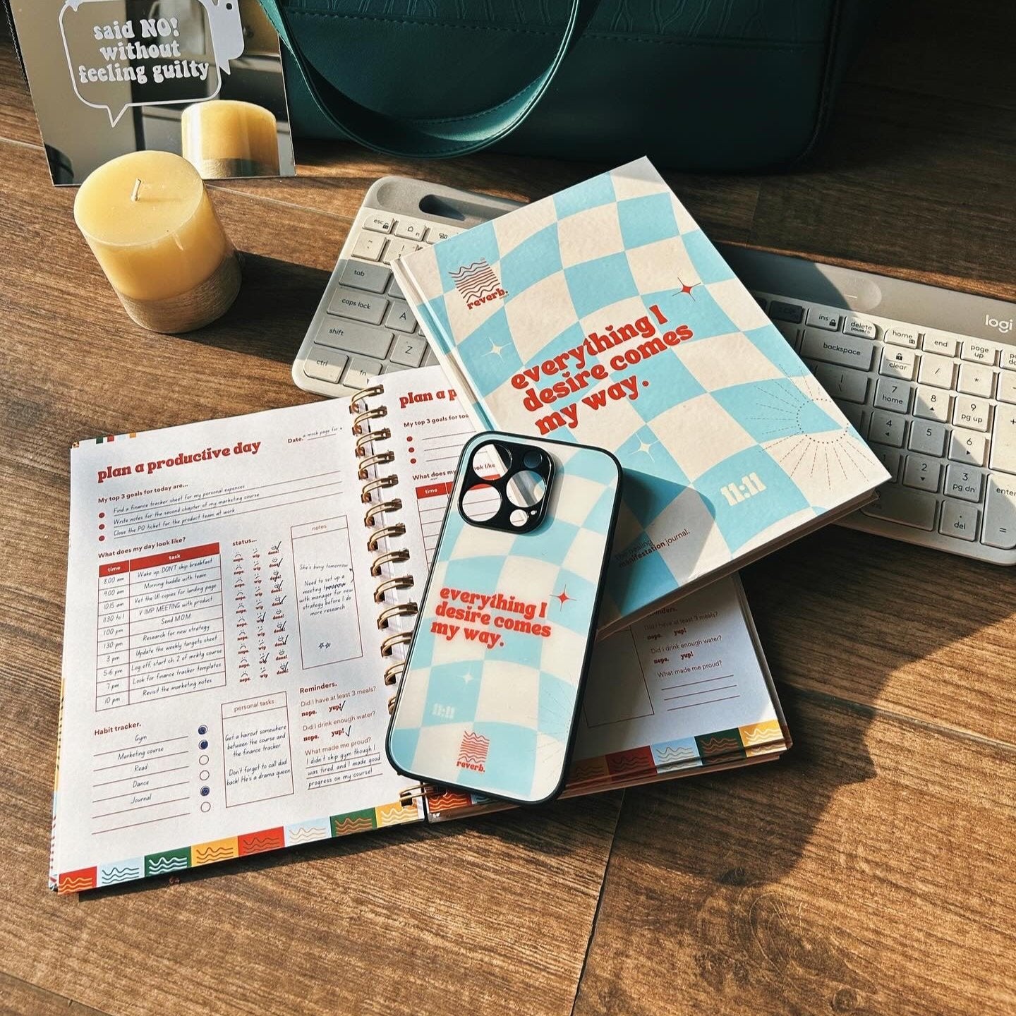 Manifestation Phone Case and Diary laid on table